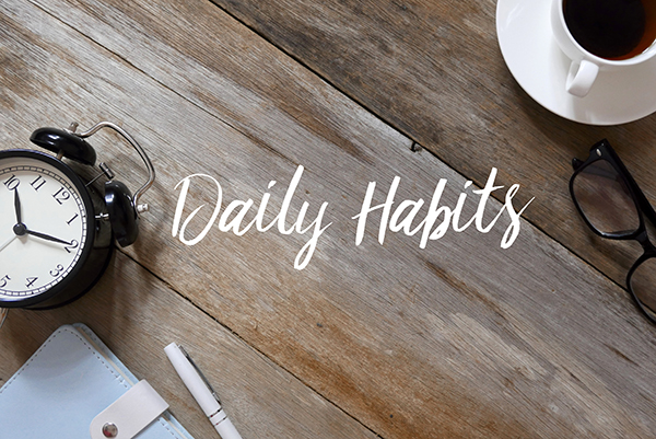 Coffee on a table with the text daily habits