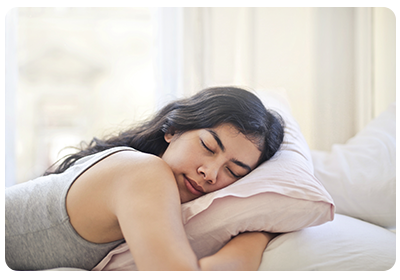 Woman sleeping on pillow