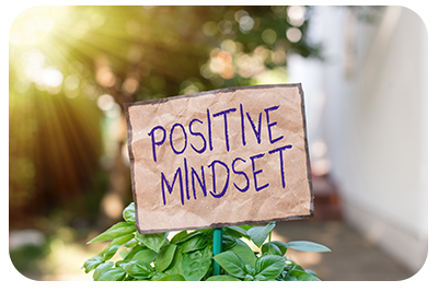 Text on a sign saying positive mindset